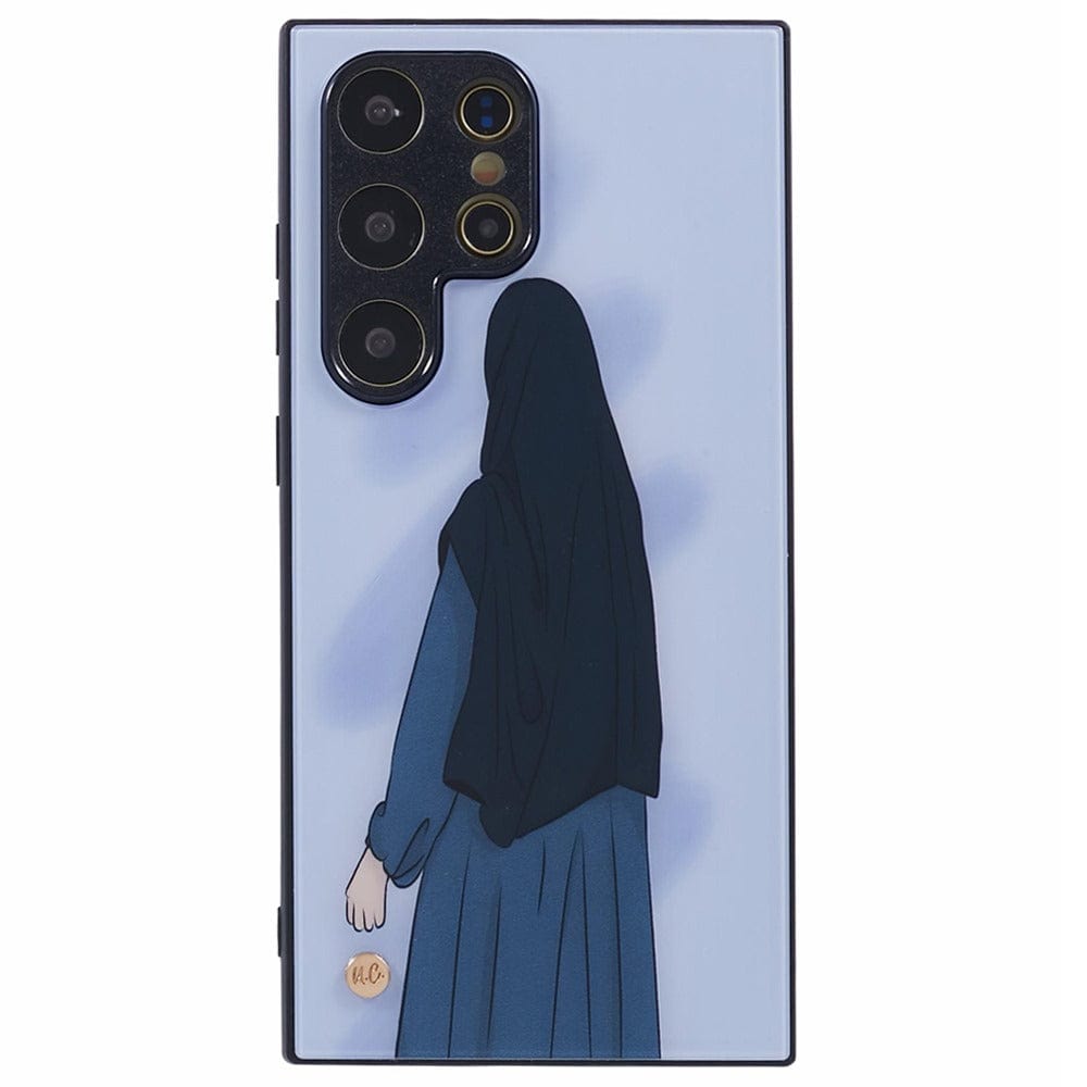 A light blue smartphone case features an illustration of a woman wearing a dark blue hijab and abaya, viewed from behind. 